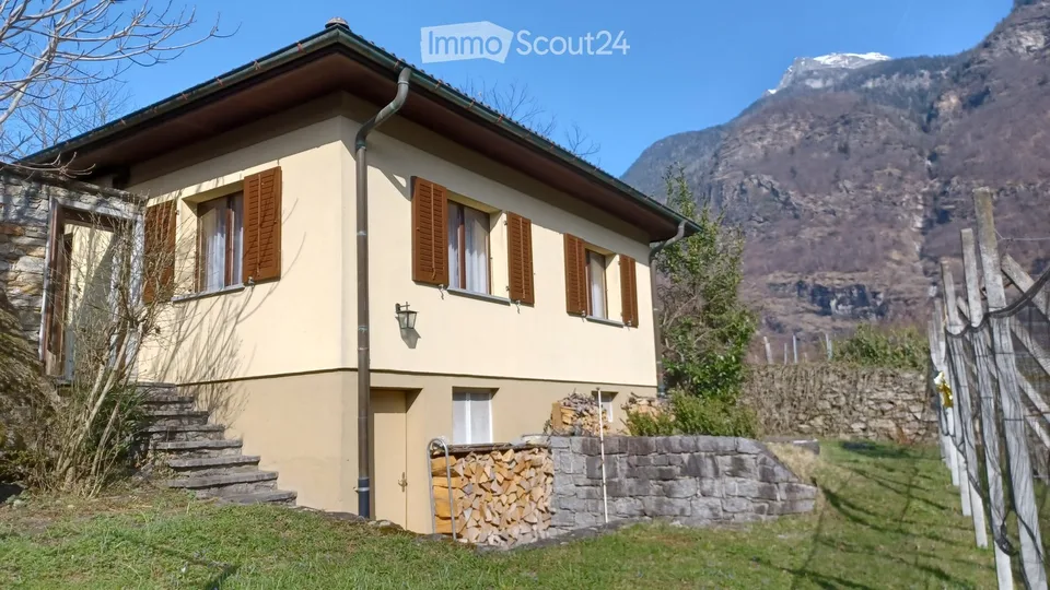 Ein Haus mit hoher Lebensqualität <>  Una casa con un'alta qualità di vita