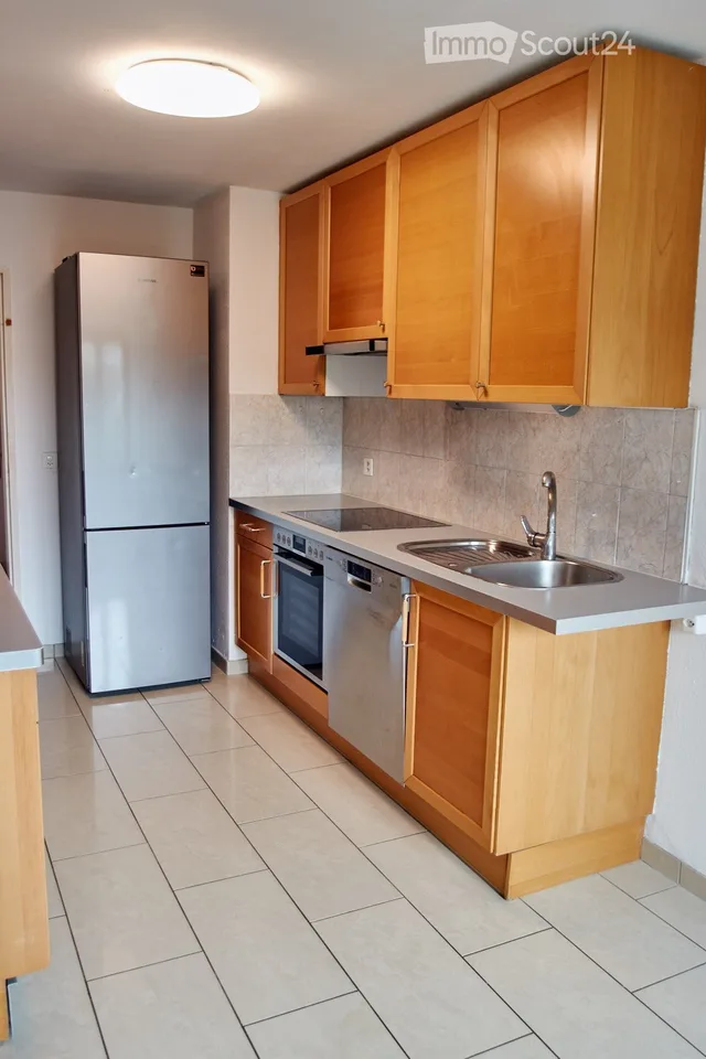 Grosszügige Wohnung mit Wintergarten, Cheminee und traumhafter Aussicht