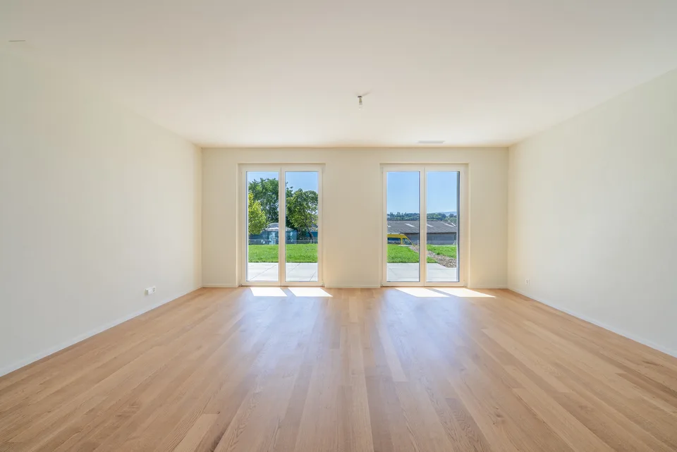 Bell'appartamento di 2,5 locali con giardino privato – foto 1 di 19