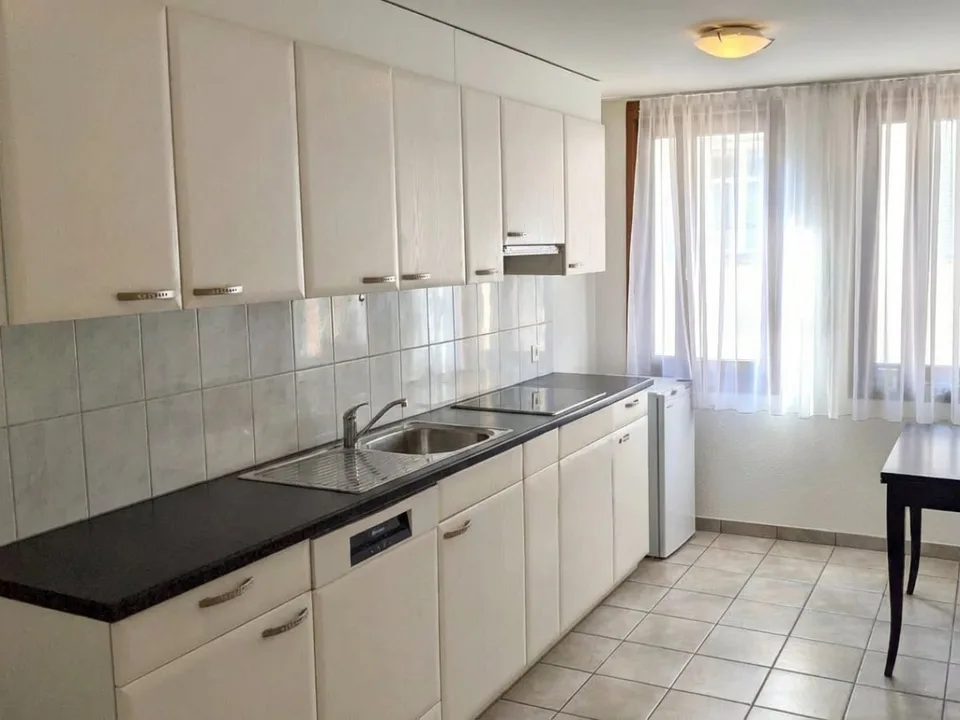 Two apartments and a retail space - all rented