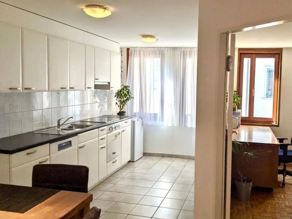 Two apartments and a retail space - all rented