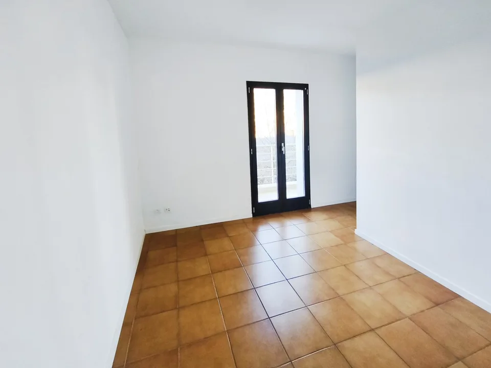 Intéressante maison bifamiliale de deux 3,5 pièces avec jardin à proximité du centre