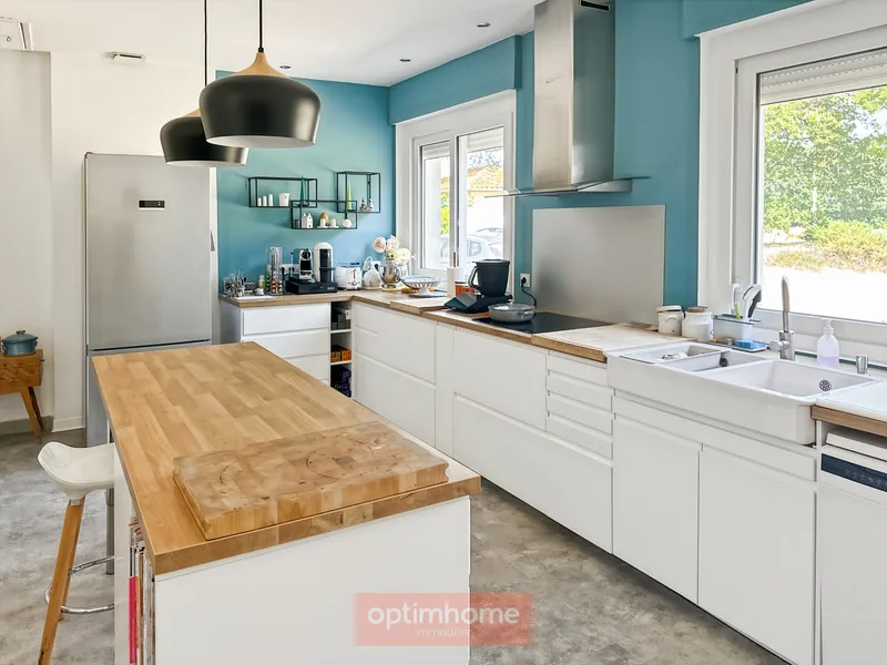 A charming, renovated house full of charm and character on its wooded park