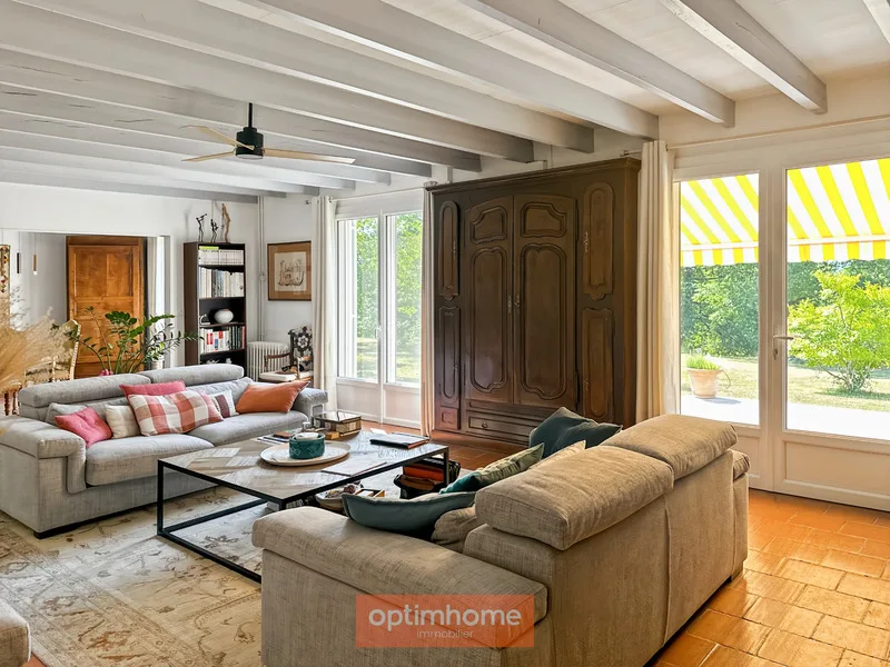 A charming, renovated house full of charm and character on its wooded park