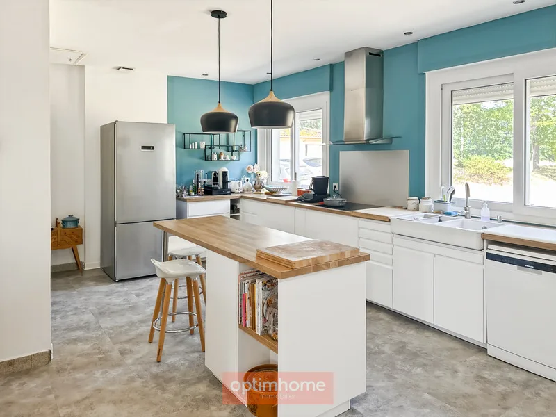 A charming, renovated house full of charm and character on its wooded park