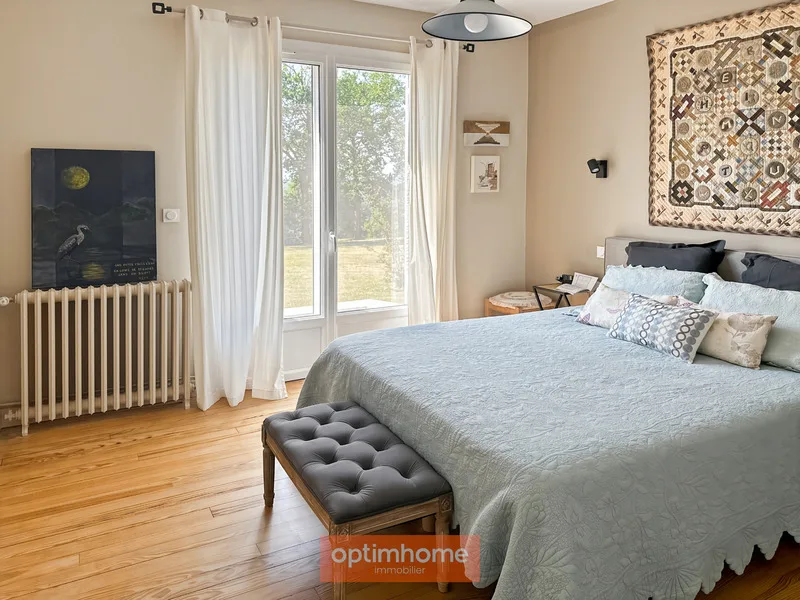 A charming, renovated house full of charm and character on its wooded park