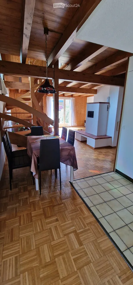 Charming corner row house with garden, garage & parking space in Neuwilen