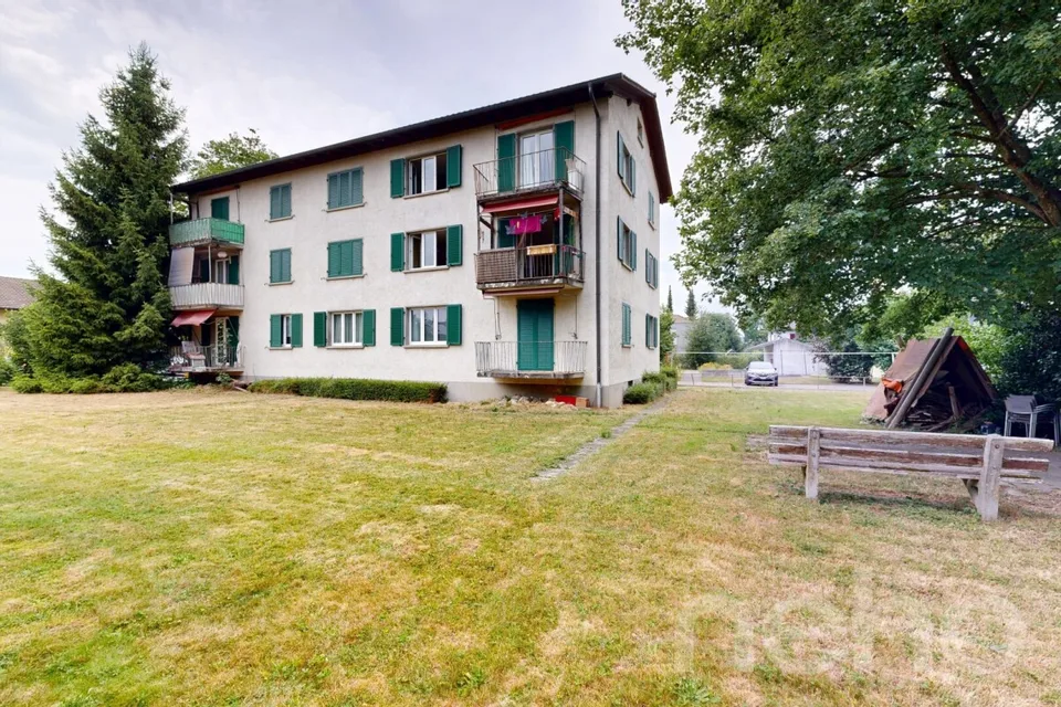 Maison multifamiliale entièrement louée avec un potentiel de développement attractif