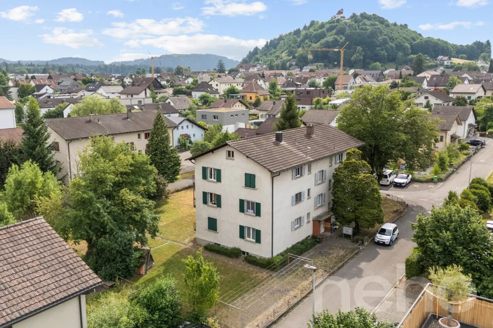 Maison multifamiliale entièrement louée avec un potentiel de développement attractif