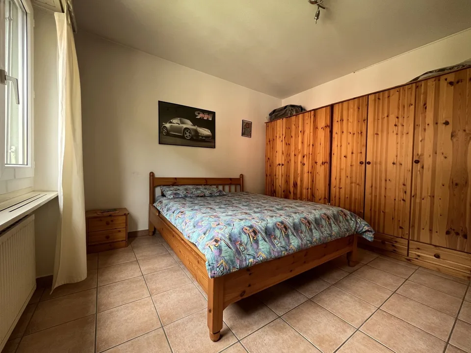 BRIGHT ATTIC APARTMENT 4.5 ROOMS WITH GREEN VIEW IN LUMINO