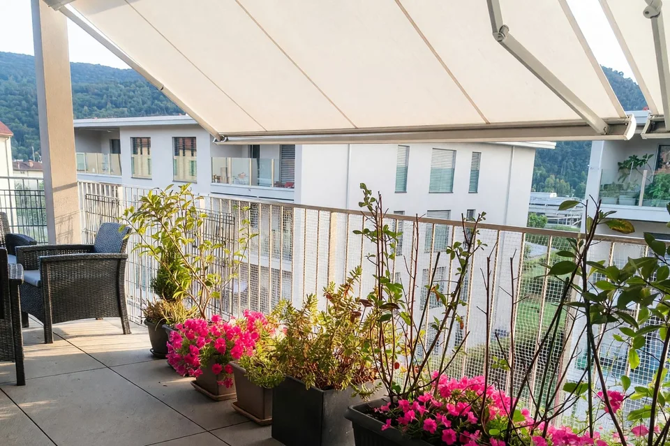 Elegante nuovo 3,5 con ampio terrazzo e camera con bagno ensuite