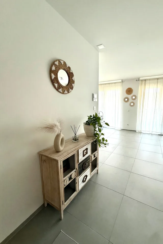 Elegante nuovo 3,5 con ampio terrazzo e camera con bagno ensuite
