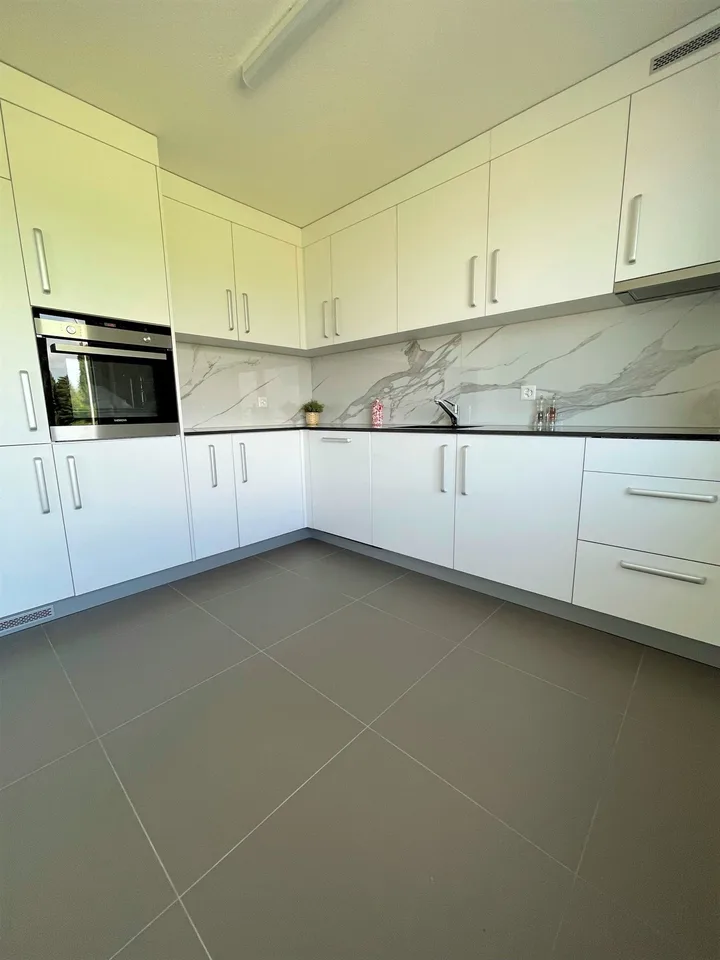 Your dream home is waiting! Stylish jewel of a home with balcony near the lake