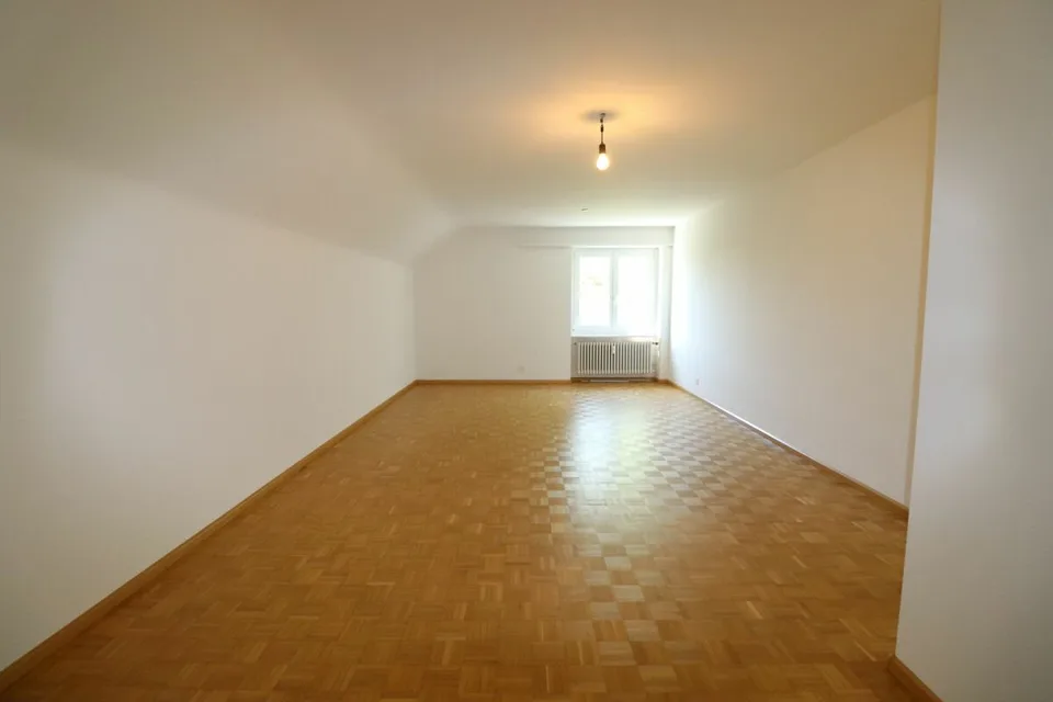 Living in Riehen - spacious 3 1/2-room apartment with additional attic room in a quiet neighborhood street