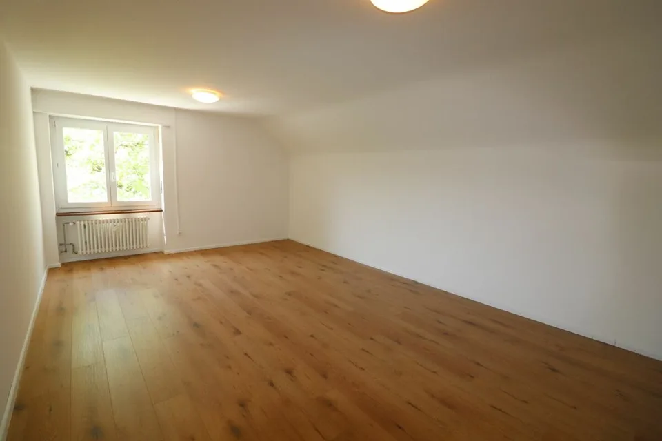 Living in Riehen - spacious 3 1/2-room apartment with additional attic room in a quiet neighborhood street
