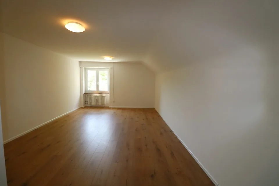 Living in Riehen - spacious 3 1/2-room apartment with additional attic room in a quiet neighborhood street