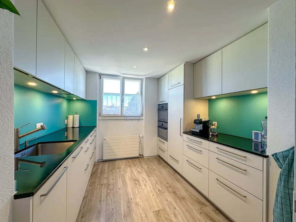 Maison de deux familles charmante avec deux appartements de 4 pièces au centre du village