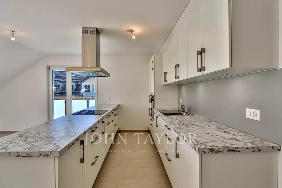 Appartement attique en duplex de 5.5 pièces