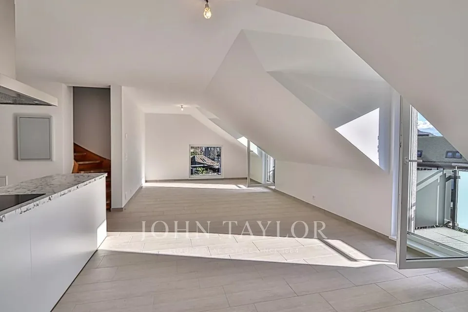 Appartement attique en duplex de 5.5 pièces