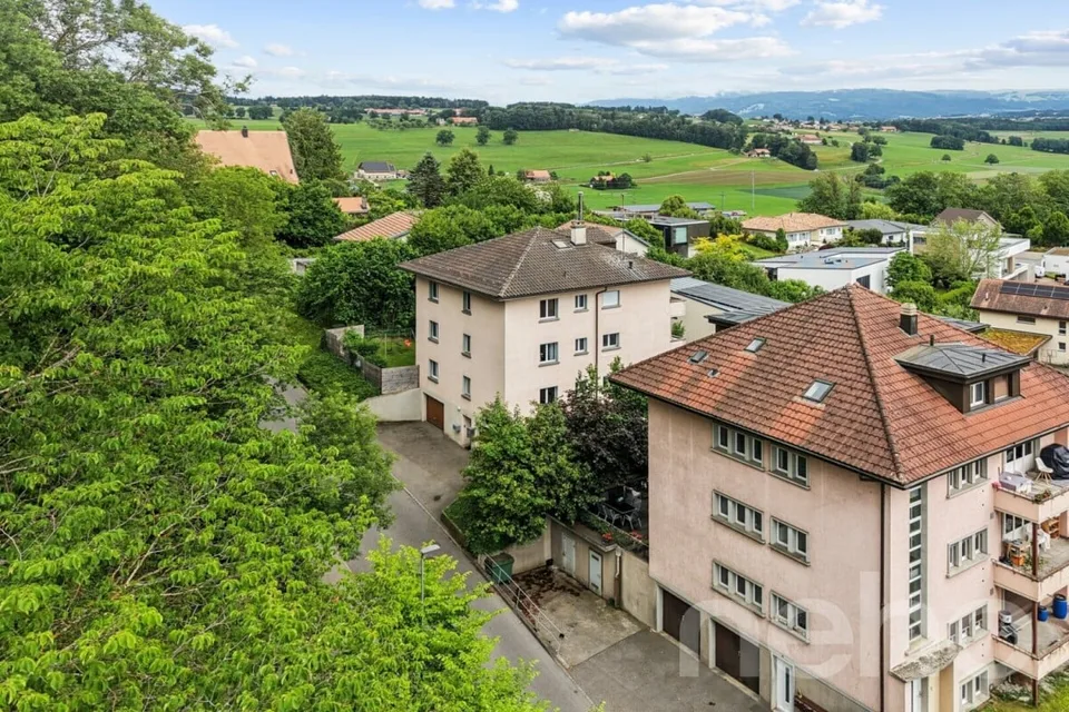 Rental building in the heart of Romont with potential gross yield of 5 %