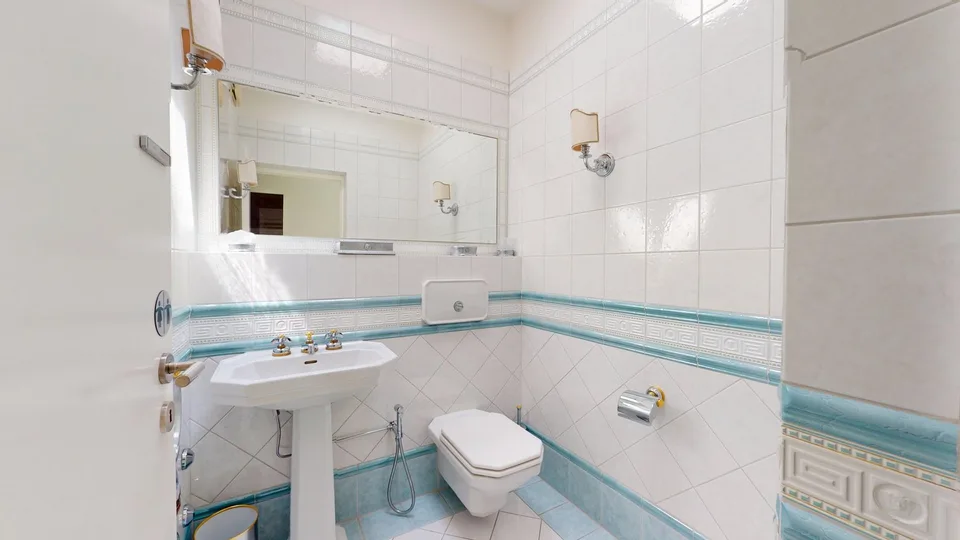 Representative 284sqm attic apartment with lift, two underground parking spaces, three balconies, and private sauna