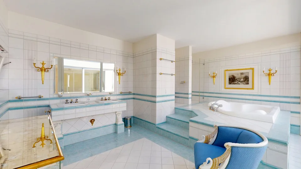 Representative 284sqm attic apartment with lift, two underground parking spaces, three balconies, and private sauna