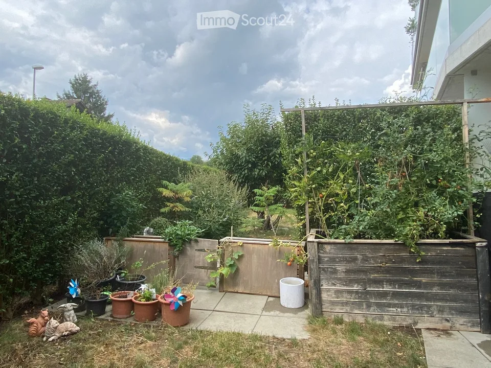 Appartamento familiare di 4,5 locali con giardino e 2 posti auto