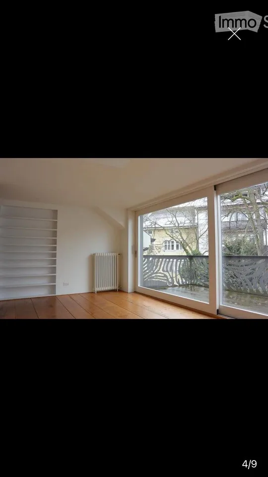 Charmante 3-Zimmer-Wohnung mit Kamin und Balkon am Spalentorweg, Basel