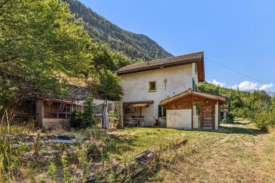 Casa di carattere in un ambiente naturale con vista aperta