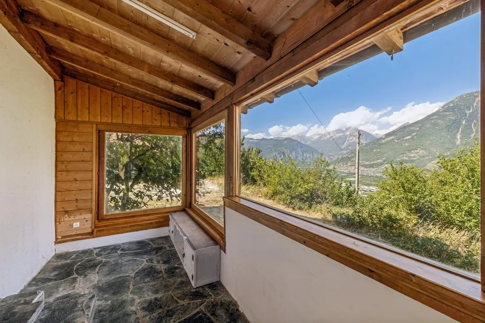 Casa di carattere in un ambiente naturale con vista aperta