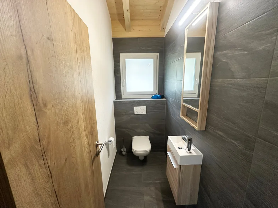 Champlan, appartement en attique de 4.5 pièces avec 3 places de parc extérieures