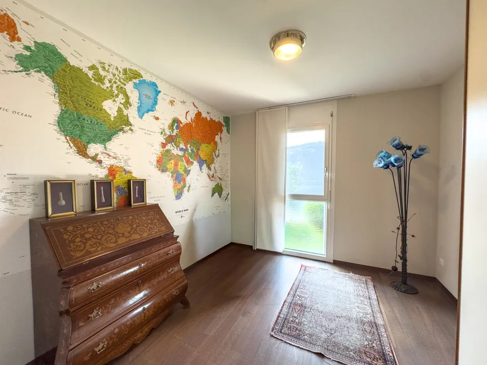 Appartement avec vue sur le lac et jardin à Bissone