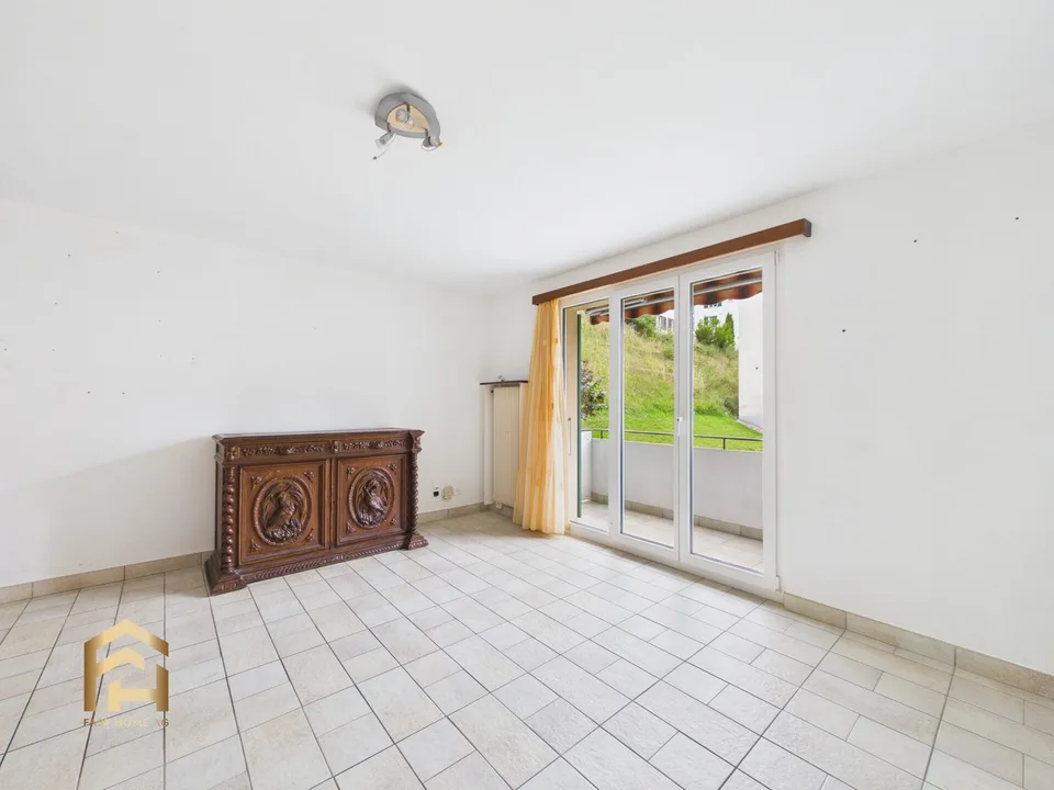 Opportunità di investimento attraente: Appartamento di 4,5 locali ristrutturato con piccolo balcone