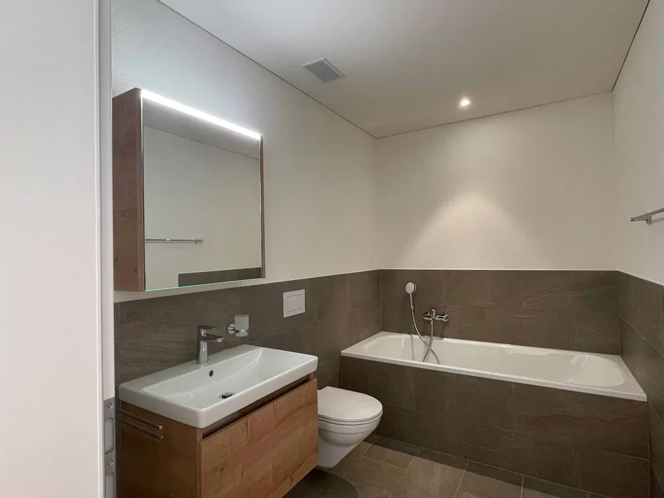 Appartement de jardin 3.5 pièces de haute qualité en norme de propriétaire occupant