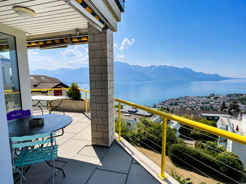 Attique d'exception avec vue panoramique sur le lac et les montagnes