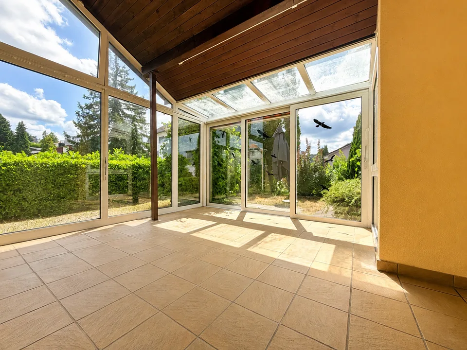 Charmantes Einfamilienhaus mit Wintergarten und sonnigem Garten