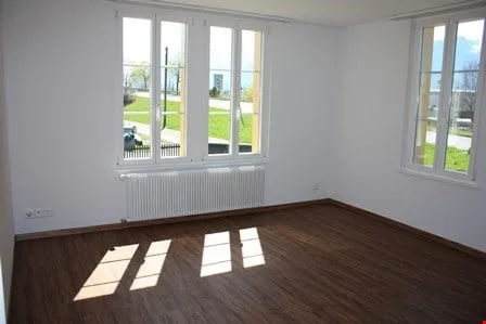 Appartement lumineux dans une maison de 2 familles avec jardin – situé au centre et confortable