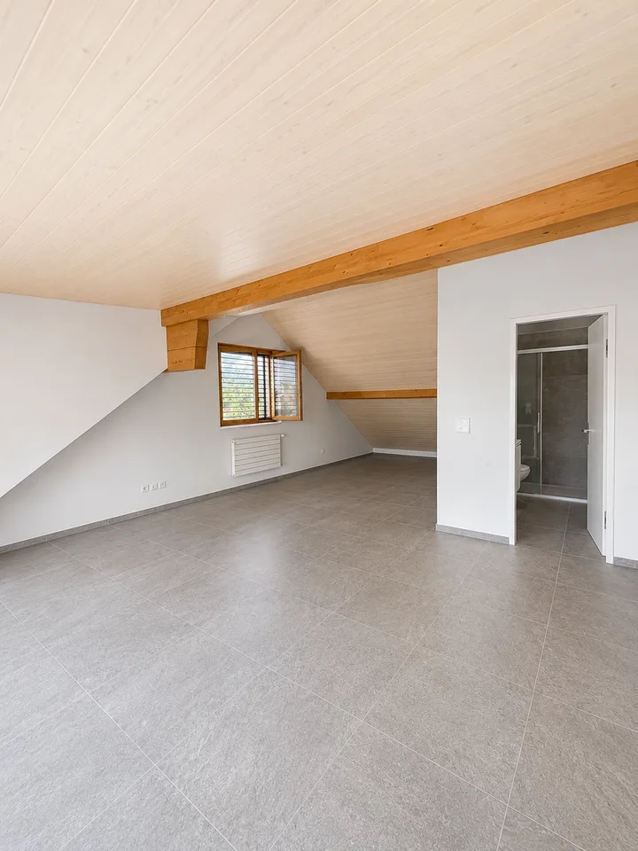 Charming 2.5-room apartment on the top floor in Givisiez
