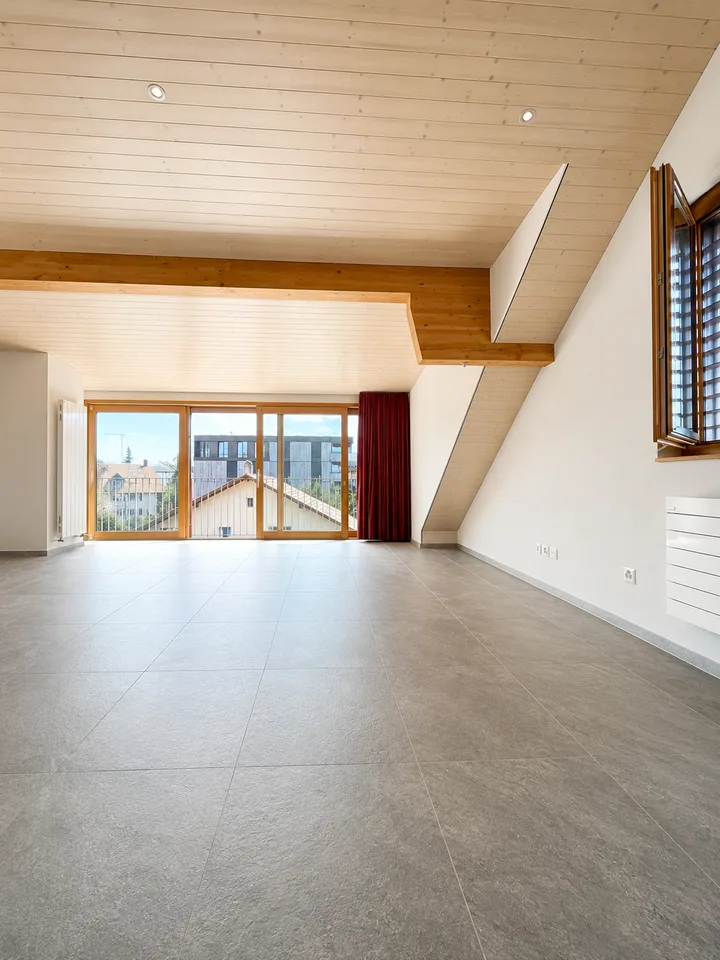 Charming 2.5-room apartment on the top floor in Givisiez