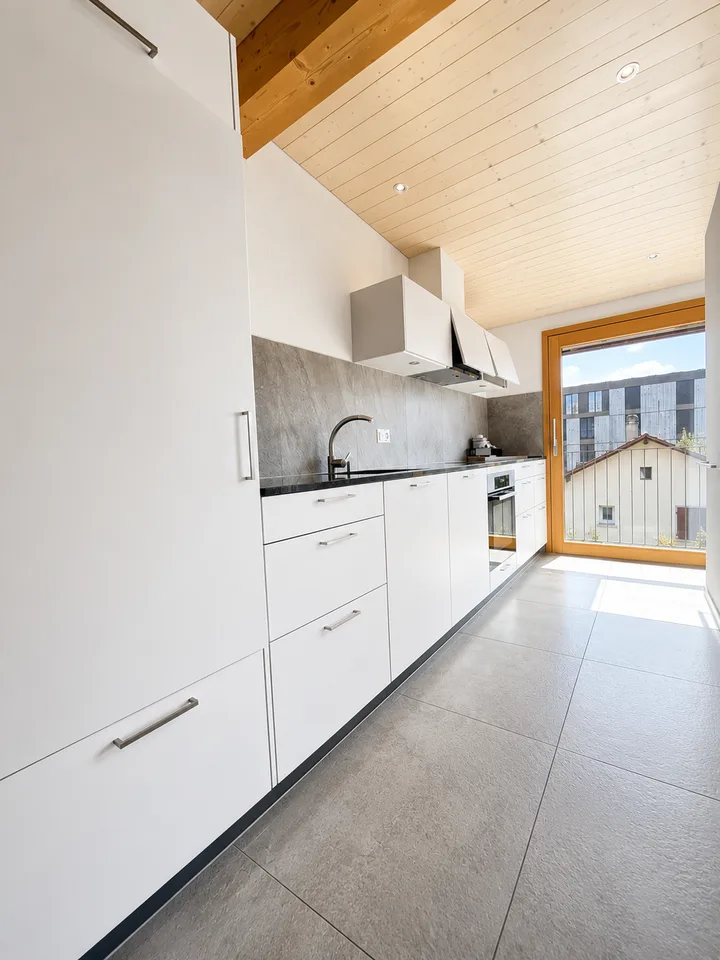 Charmant appartement de 2,5 pièces au dernier étage à Givisiez