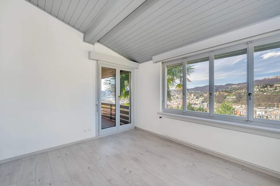 VILLA 5.5 LOCALI CON VISTA CITTÀ E LAGO DI LUGANO