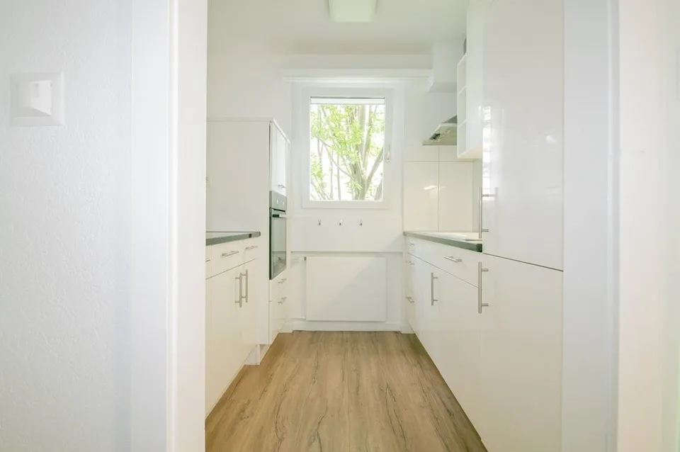 Spacious apartment with modern kitchen, balcony, and terrace