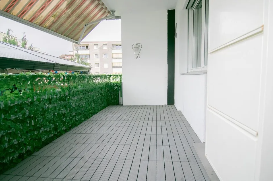 Spacious apartment with modern kitchen, balcony, and terrace