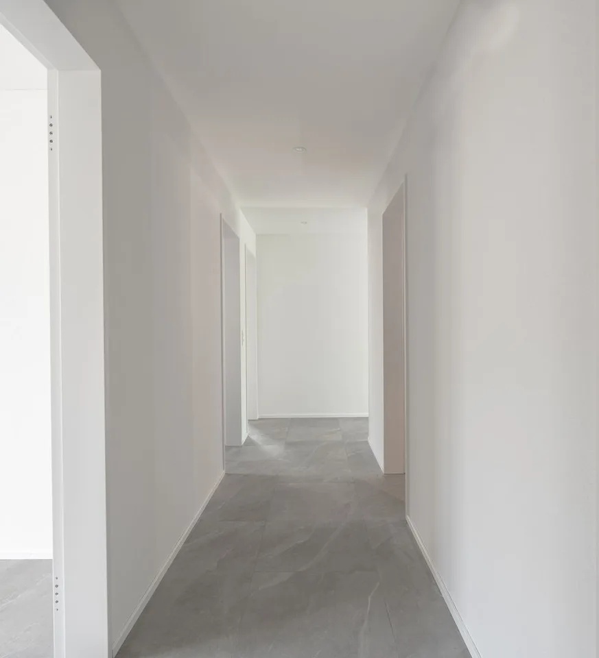 Appartement neuf de 4,5 pièces de haute qualité avec jardin d'hiver au rez-de-chaussée