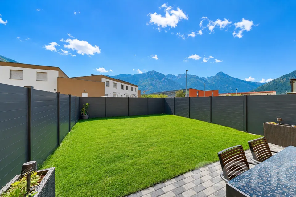 Bella casa a schiera di 4,5 locali con giardino e vista aperta – foto 11 di 14