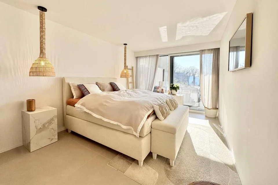 Appartement d’exception avec terrasse panoramique et vue sur le lac – photo 6 sur 13