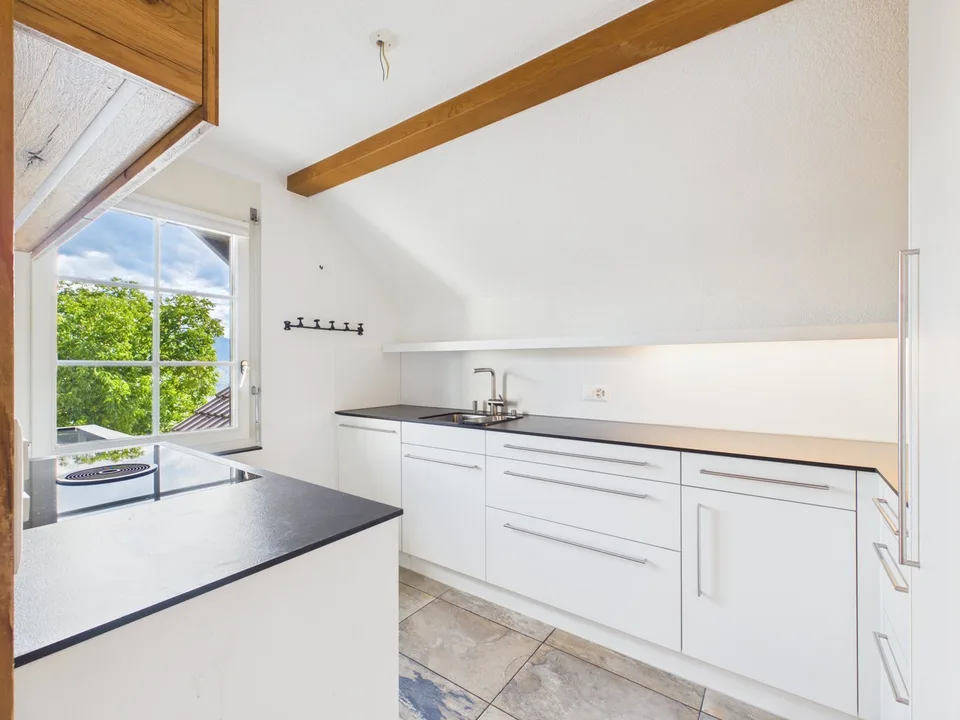 3,5 Zimmer Dachwohnung mit Bergsicht und Raumhöhe – Foto 15 von 21