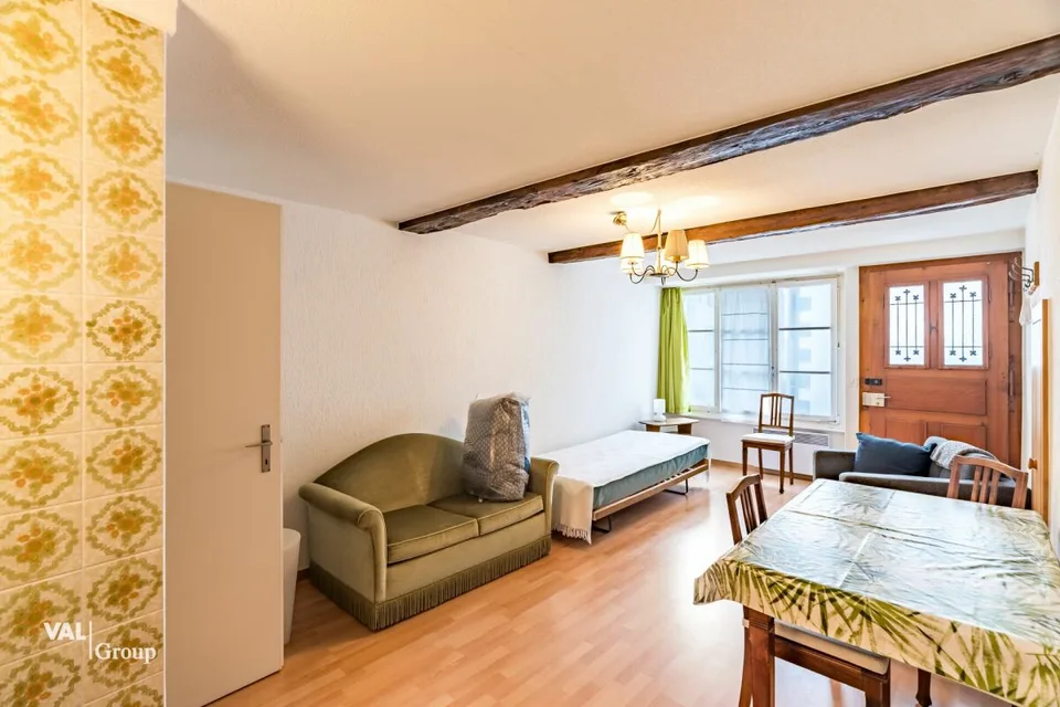 Fascino storico e comfort moderno in una casa a due famiglie unica