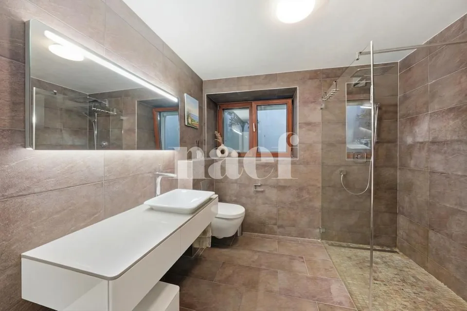 Bright and modern 3.5-room apartment on the ground floor with large terrace