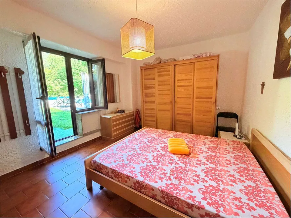 Grazioso bilocale con terrazza, piscina e garage – foto 6 di 13